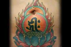 8 year old healed belly tattoo